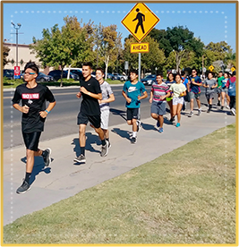Students running in an outside event 
